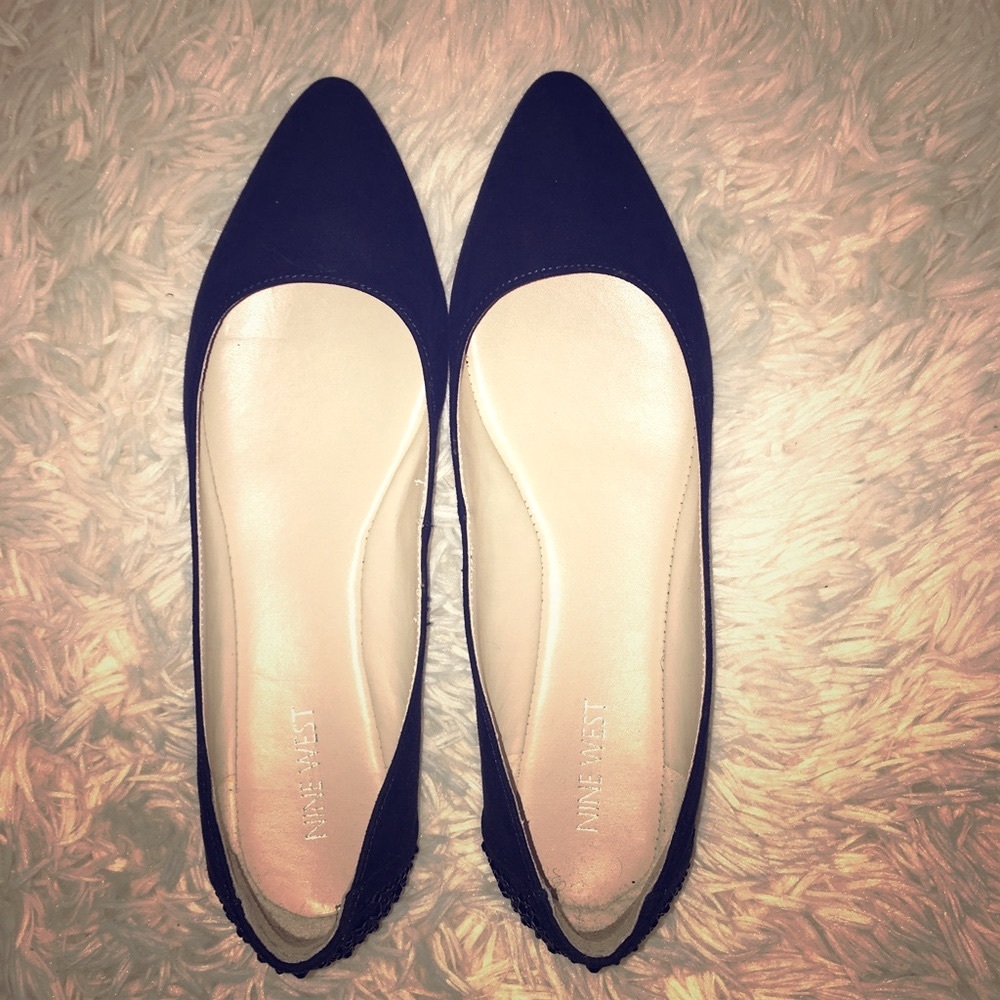 Pointed navy suede flats